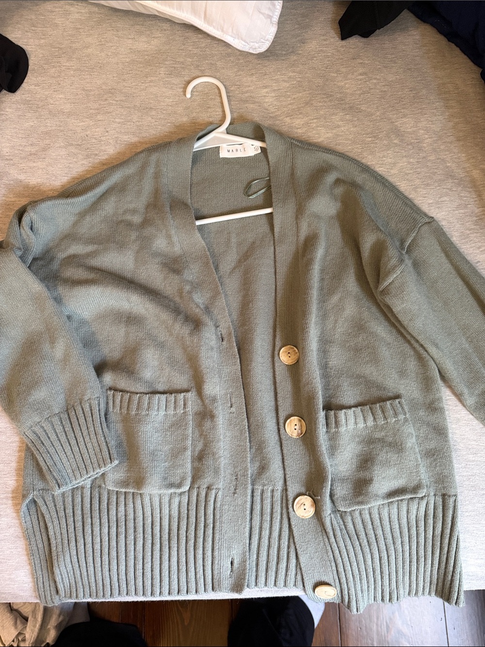 Three piece outfit. Never used comes with the cardigan, skirt and crop top.